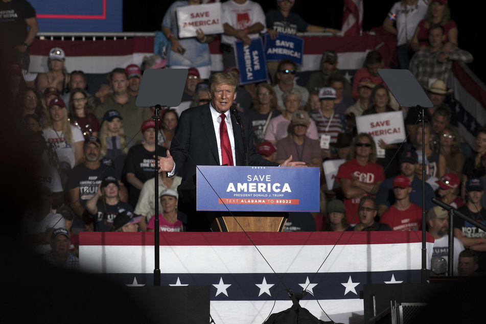 Former President Trump was booed at an Alabama rally after encouraging his supporters to get the vaccine.