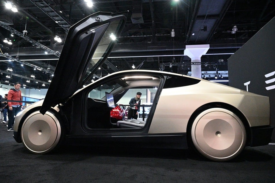 Tesla's Cybercab robotaxi is displayed during the AutoMobility LA 2024 auto show at the Los Angeles Convention Center in Los Angeles, November 21, 2024.
