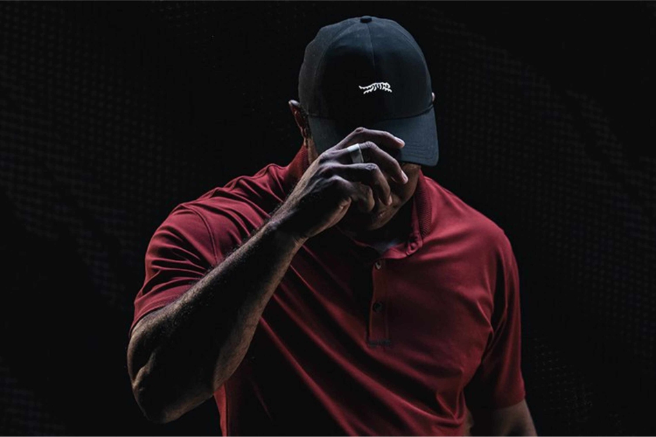 Sun Day Red showed off its new campaign and apparel on X, worn by founder Tiger Woods.