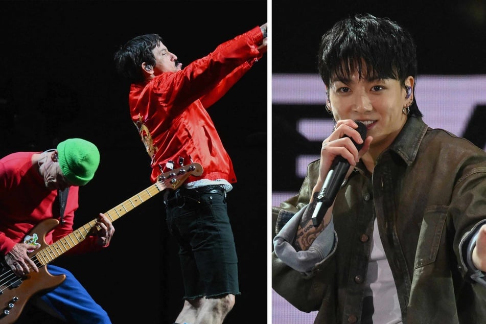 Red Hot Chili Peppers' bassist Flea (l.) and singer Anthony Kiedis performed during a rainy Global Citizen Festival at Central Park in New York alongside K-pop singer Jungkook (r.).