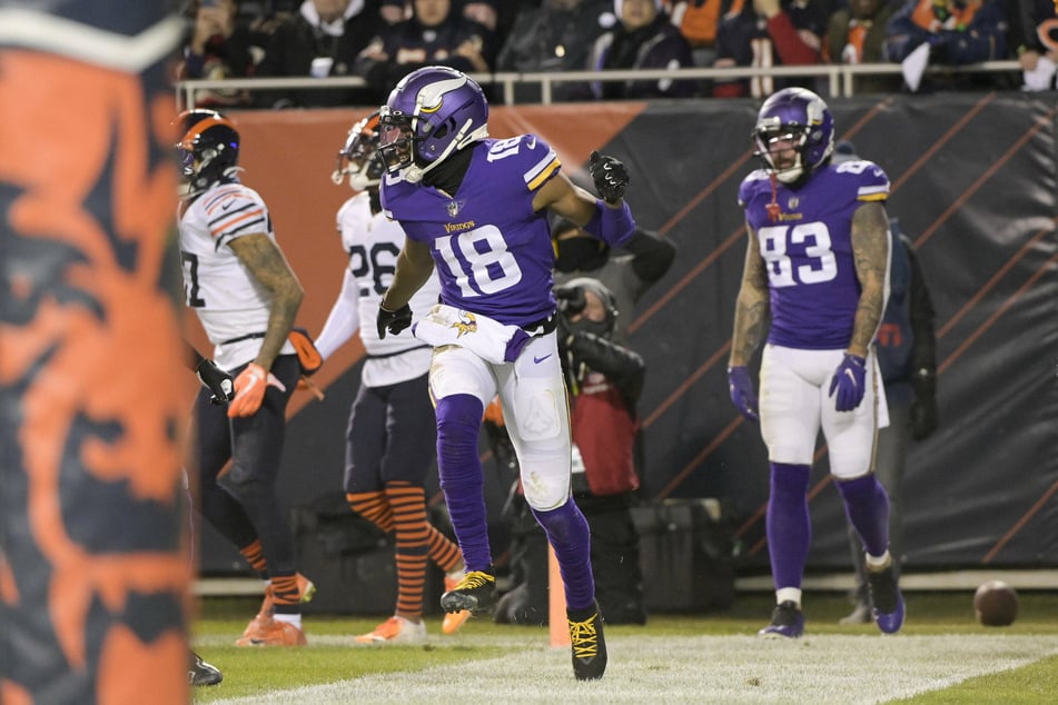 Justin Jefferson (c) of the Vikings celebrates his first quarter touchdown against the Chicago Bears.