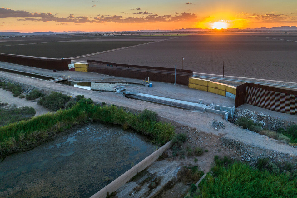 Some of the gaps in the border wall built by the Trump Administration between the US and Mexico were recently filled in with shipping containers by the Arizona state government, making it more difficult for immigrants to cross. Border construction has damaged wildlife in the area.