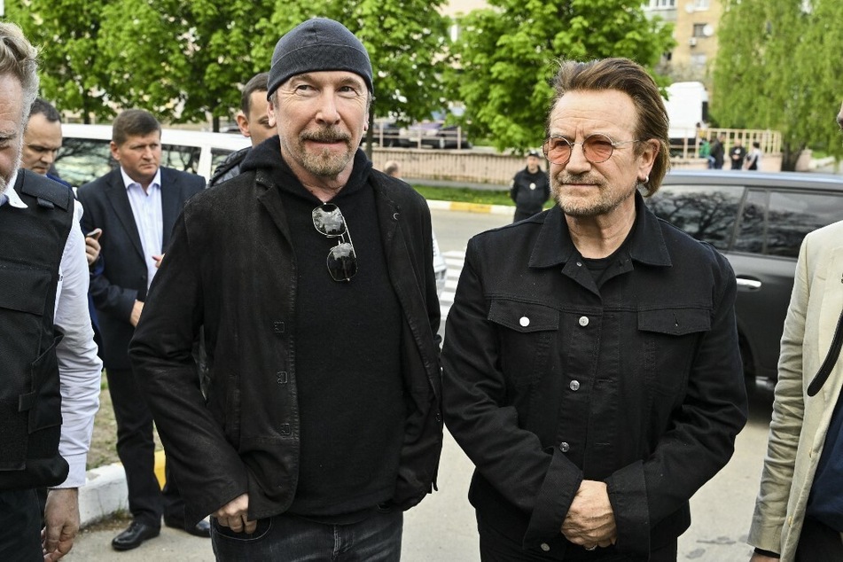 The Edge (l.) and Bono get a tour of the small town of Bucha, where hundreds of civilian casualties were revealed after Russian solders withdrew back in March.