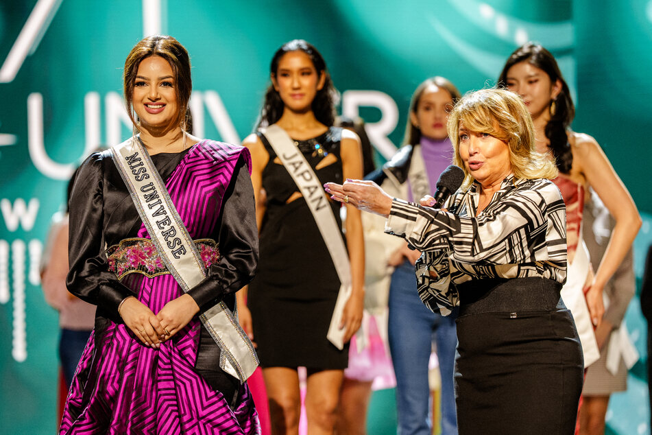 Paula Shugart (r) and Miss Universe 2022 Harnaaz Sandhu (l) at a press conference at the New Orleans Morial Convention Center on January 12, 2023 in New Orleans.