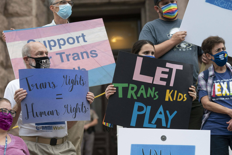 LGBTQ+ activists protested the Texas legislature's attempts to limit transgender rights.