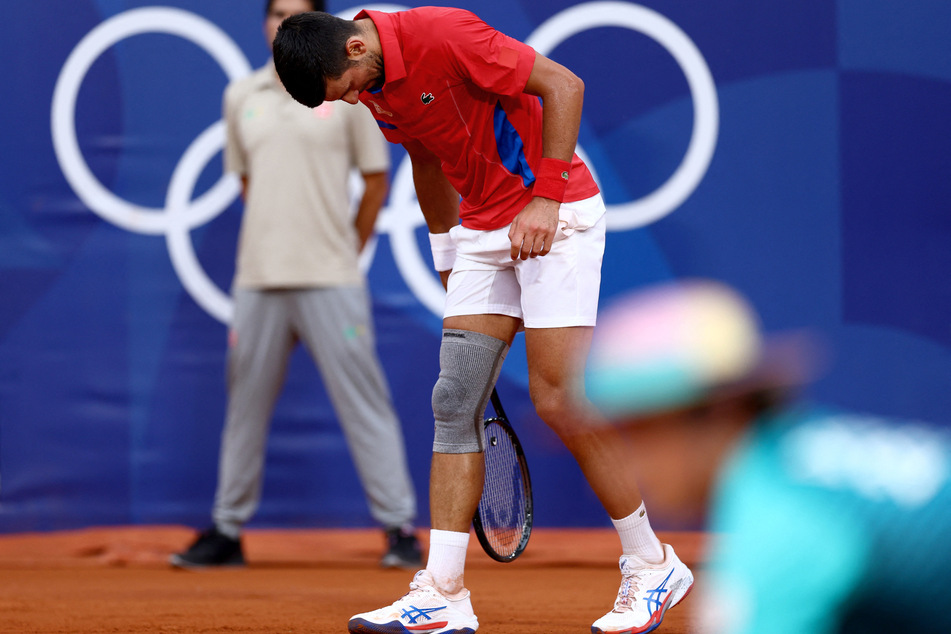 Novak Djokovic of Serbia is suffering knee troubles after his match against Stefanos Tsitsipas of Greece at the Paris Olympics.