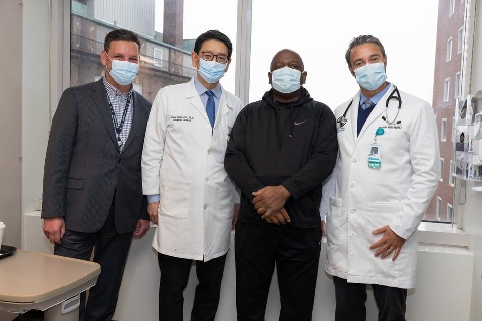 From l. to r.: Dr. Nahel Elias, Dr. Tatsuo Kawai, patient Rick Slayman, and Dr. Leo Riella pose together at Boston's Mass General hospital.