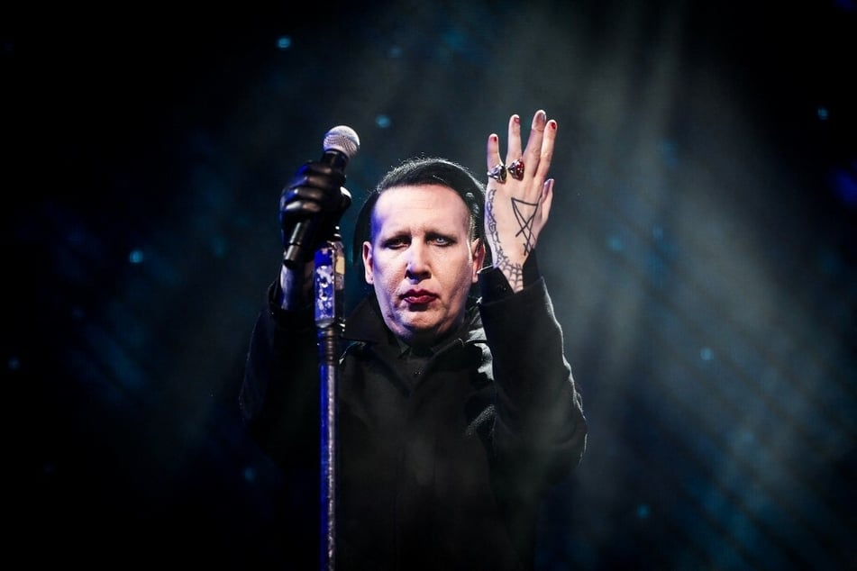 Marilyn Manson dodged a bullet as a judge threw out a sexual assault case filed by a former assistent on Wednesday.