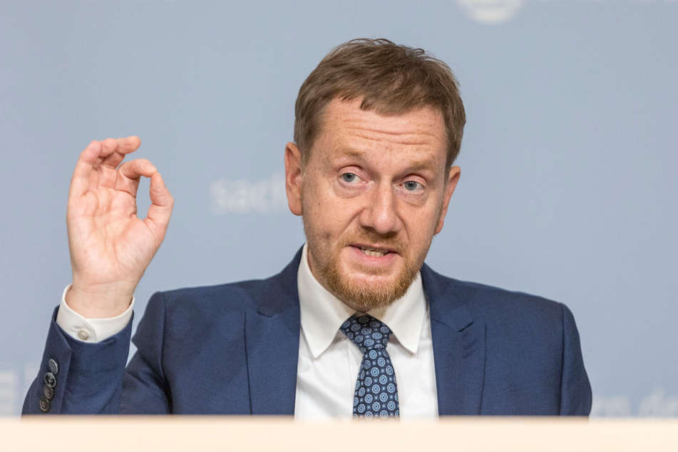 Sachsens Regierungschef Michael Kretschmer (48, CDU) nutzt die ausstehende Entscheidung über Entschädigungszahlungen für die LEAG - Stichwort: Kohleausstieg - für eine politisch motivierte Argumentation.
