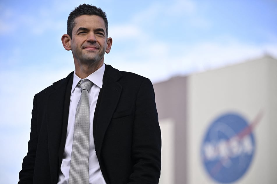 NASA Administrator Jared Isaacman looks on during the rollout of NASA's next-generation moon rocket, the Space Launch System rocket with the Orion crew capsule, at the Kennedy Space Center in Cape Canaveral, Florida, on January 17, 2026.