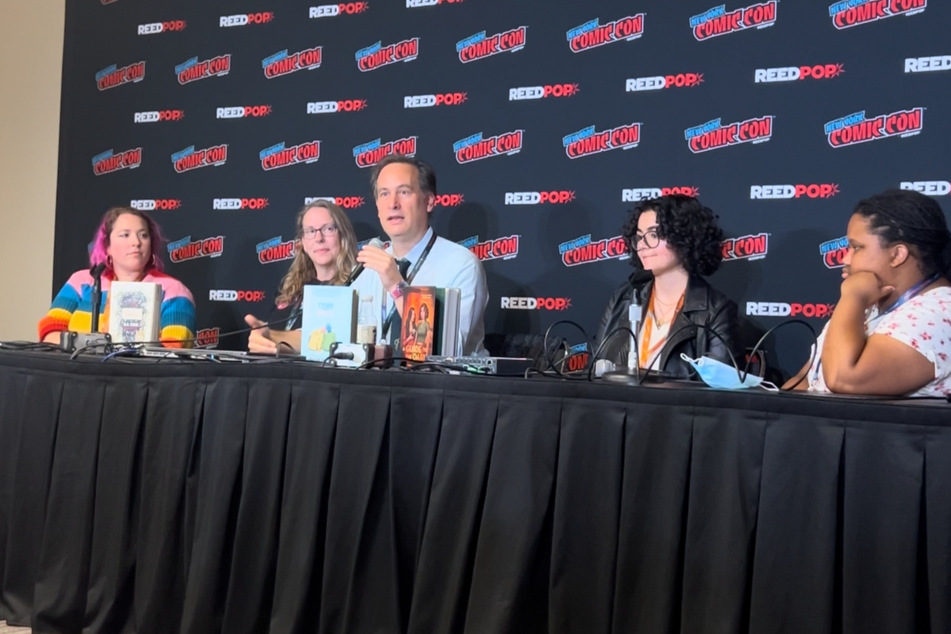 David Levithan (c.) spoke on the Queer Love in Every Genre panel at New York Comic Con 2023.