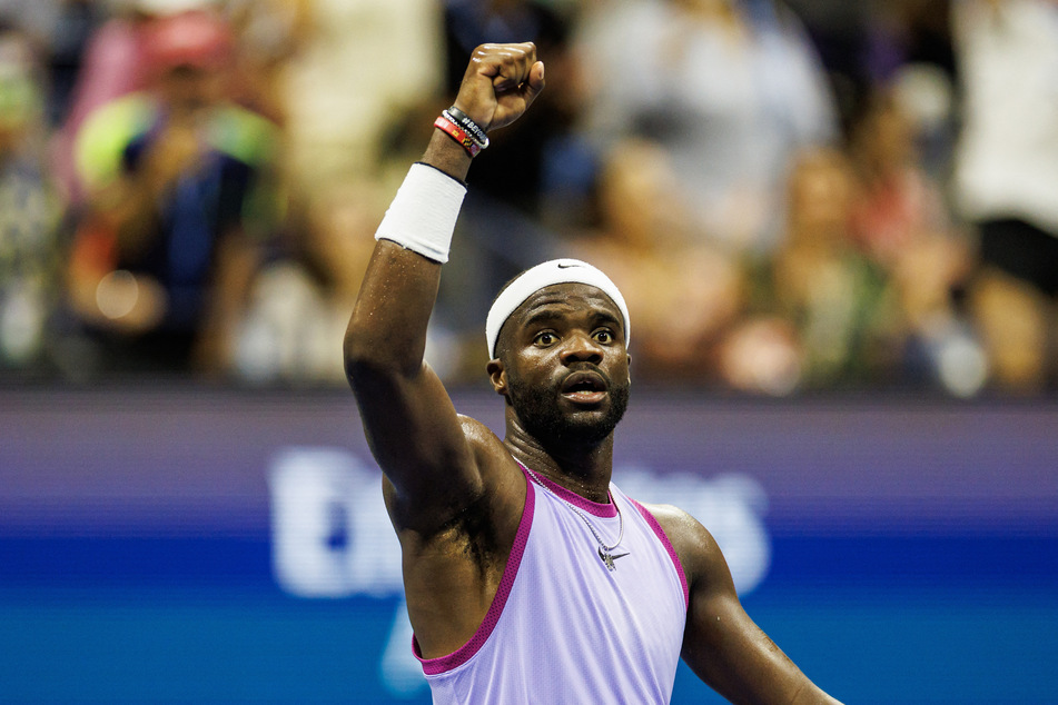 Frances Tiafoe celebrates his victory over Alexei Popyrin on day seven of the 2024 US Open.