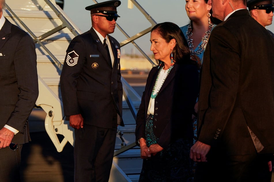 Secretary of the Interior Deb Haaland waits to greet President Joe Biden (not pictured) on his arrival at Phoenix Sky Harbor International Airport in Arizona.