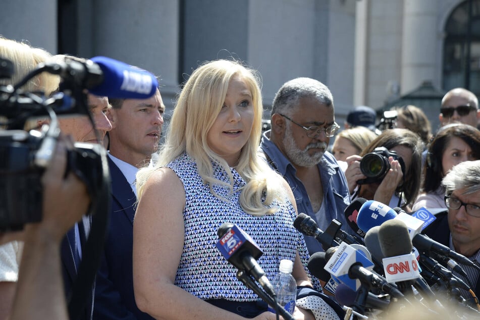 Victoria Giuffre, Prince Andrew's accuser, speaking to reporters in 2019.