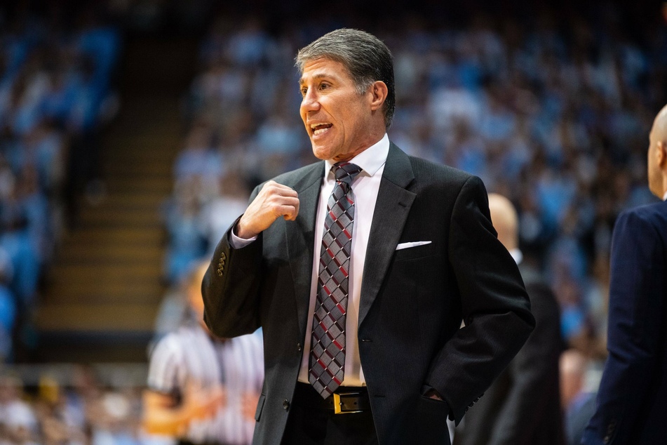 Louisville Cardinals assistant coach Dino Gaudio faces up to two years in prison after being federally charged with extortion