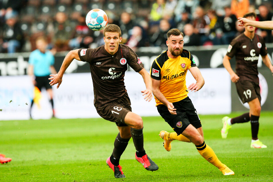 Dynamo ging bei St. Pauli leer aus. Hier ist Jakov Medic (l.) schneller am Ball als SGD-Kämpfer Morris Schröter (2.v.r.).