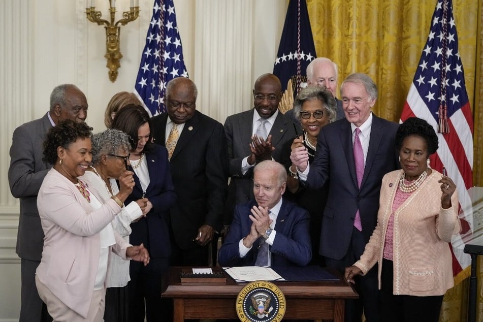 President Joe Biden signs the Juneteenth National Independence Day Act into law on June 17, 2021.