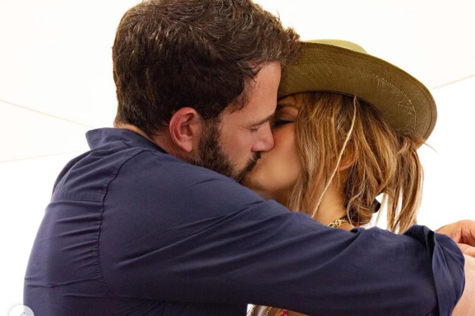 Ben Affleck and Jennifer Lopez share a passionate kiss on J. Lo's 52nd birthday.