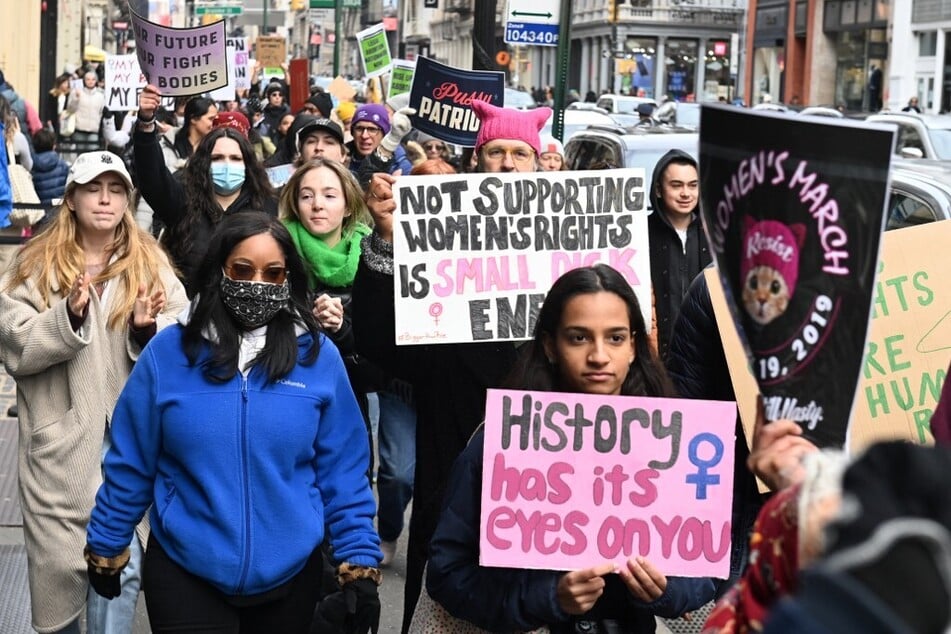 Protesters take part in the annual National Women's March in New York on January 22, 2023, marking the 50th anniversary of Roe v. Wade.