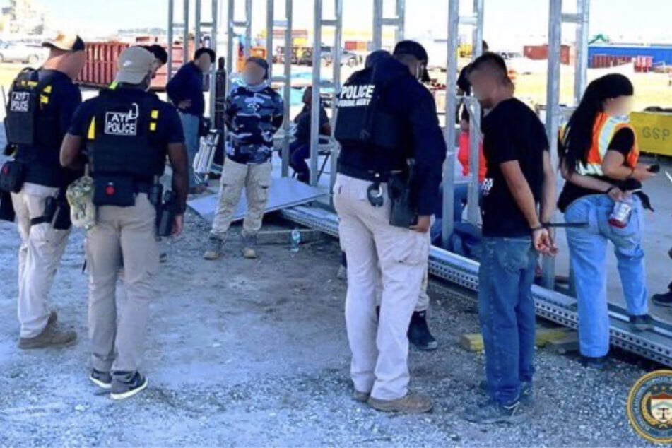 Federal immigration officers arrested 475 people in a raid on a Hyundai manufacturing site in Ellabell, Georgia.