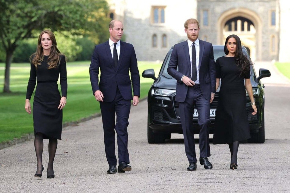 Prince Harry (center r.) and Meghan Markle (r.) have been on the outs with the royal family since the pair stepped down from their roles as working royals in 2020.