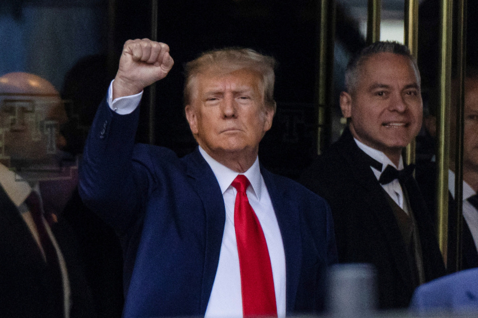 Donald Trump departing from Trump Tower to head to Manhattan Criminal Court for his court appearance on Tuesday.