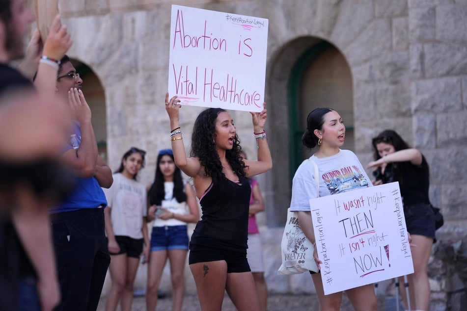 Protesters in Phoenix, Arizona, demonstrating against the Arizona Supreme Court ruling upholding a 1864 law banning abortion earlier this month.