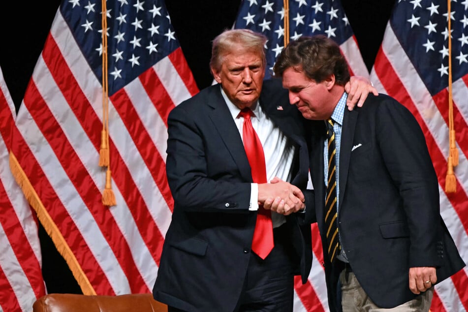 President Donald Trump defended Tucker Carlson for having Nick Fuentes on his podcast, telling journalists that "you can't tell him who to interview."