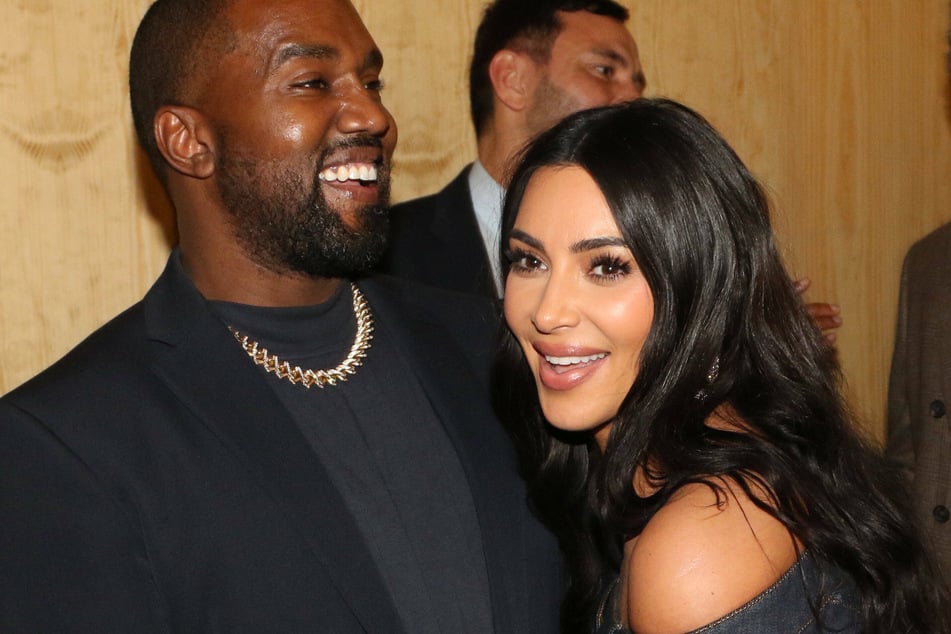 Happier times: Kanye West and Kim Kardashian were all smiles at an event in 2019.