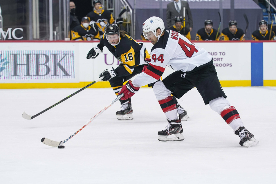 New Jersey Devils left wing Miles Wood scored two assists, but his team couldn't complete the comeback against the Pens