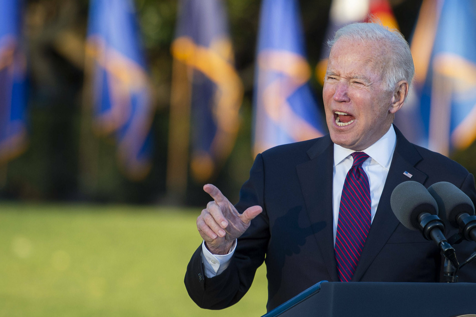 Biden asks regulator to look into "illegal conduct" by oil companies