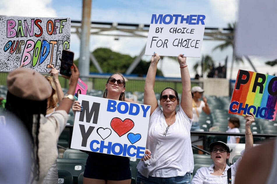 People attend Our Bodies Our Lives: A Rally for Reproductive Freedom at the Bayfront Amphitheater on September 14, 2024, in Miami, Florida. The rally was held to advocate for the passage of Amendment 4, which will be on the state of Florida's November ballot, giving women a constitutional right to abortion in the state.