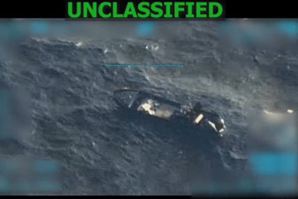 A screen grab from a video posted by Donald Trump on his Truth Social account shows US military forces conducting a strike on a boat in the Caribbean Sea on September 15, 2025.