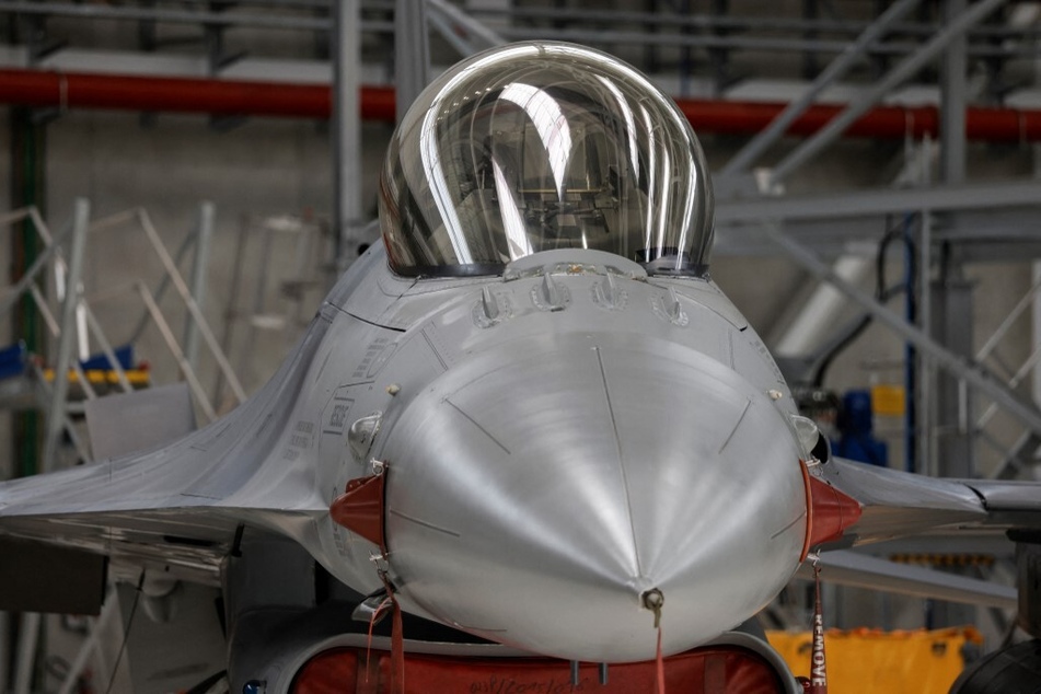 An F-16 is on display during the Ukrainian President's official visit to inspect the fighter jets at Belgium's Melsbroek military airport.