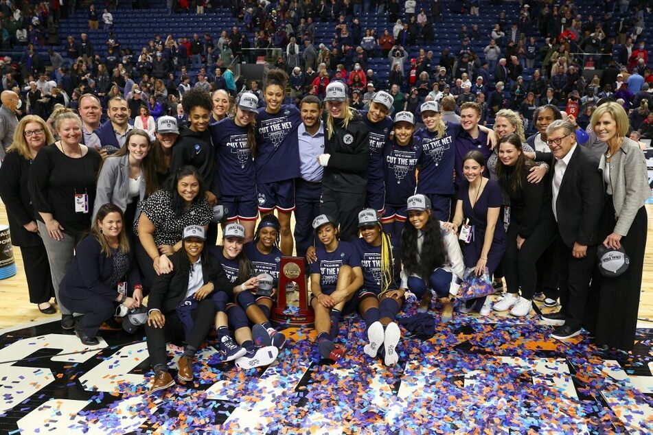 The UConn Huskies defeated the NC State Wolfpack 91-87 in 2 OT in the NCAA Women's Basketball Tournament Elite 8 Round.