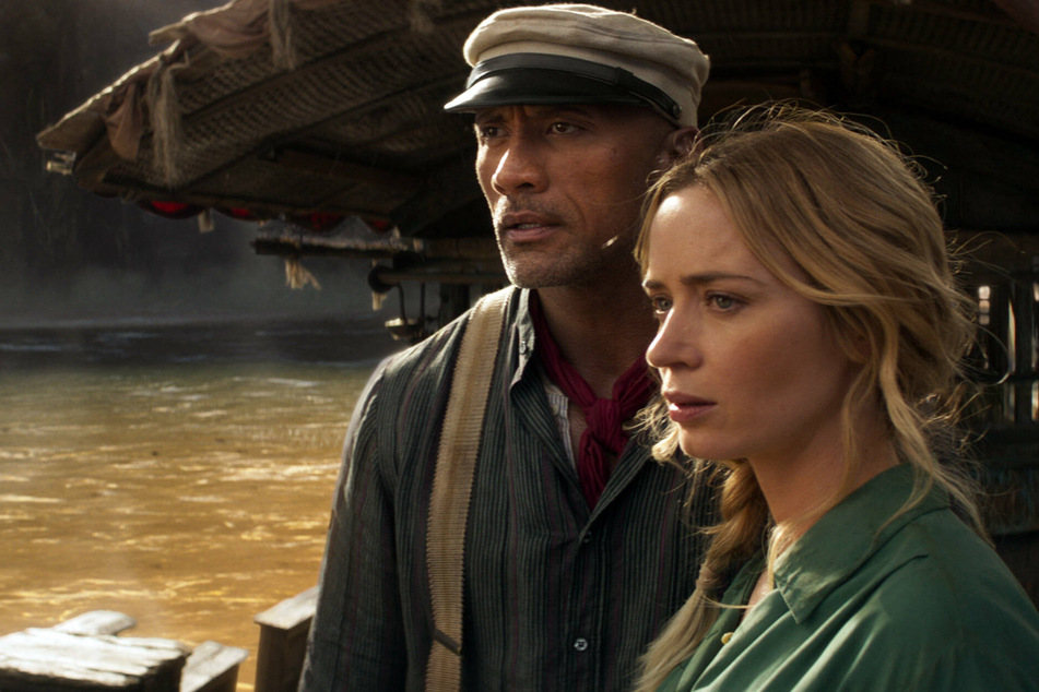 Dwayne "The Rock" Johnson (l.) and Emily Blunt star in Disney's Jungle Cruise.