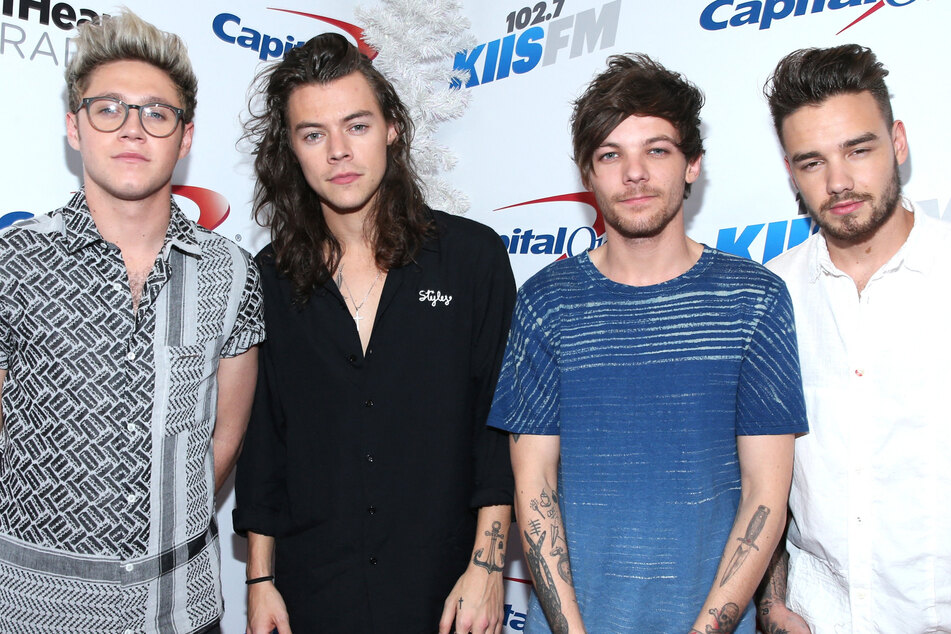 Fan theories speculating that Harry Styles (center l.) and Louis Tomlinson (center r.) were secretly dating ran rampant during the heyday of One Direction.