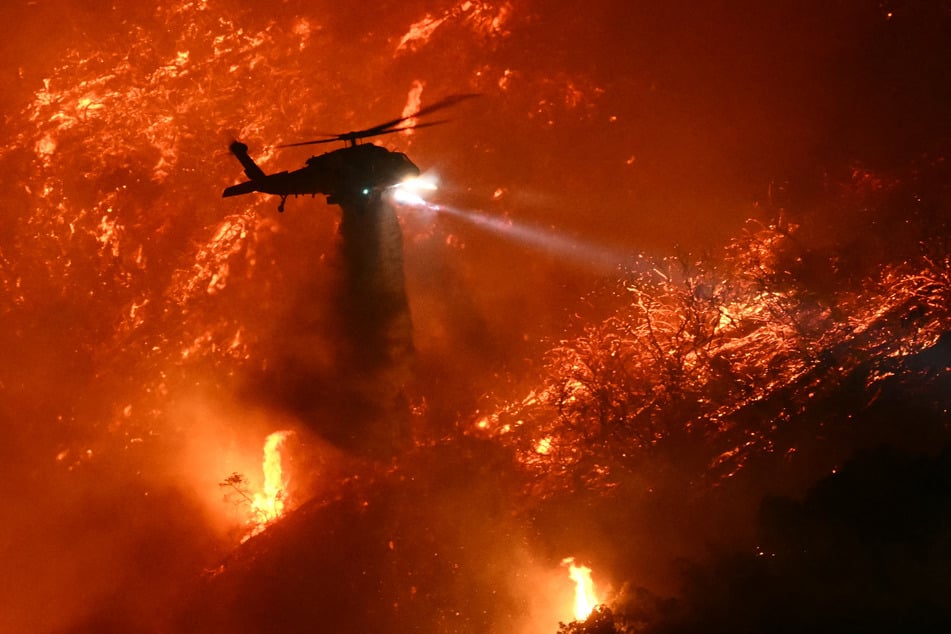 Some 37,000 acres of land have been consumed by fires still raging all over the Los Angeles area.