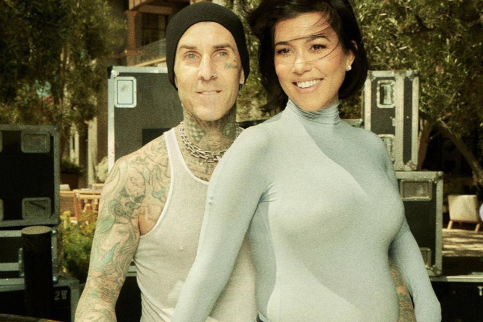 Kourtney Kardashian and Travis Barker shared that they are expecting a baby boy during their rocking gender reveal.