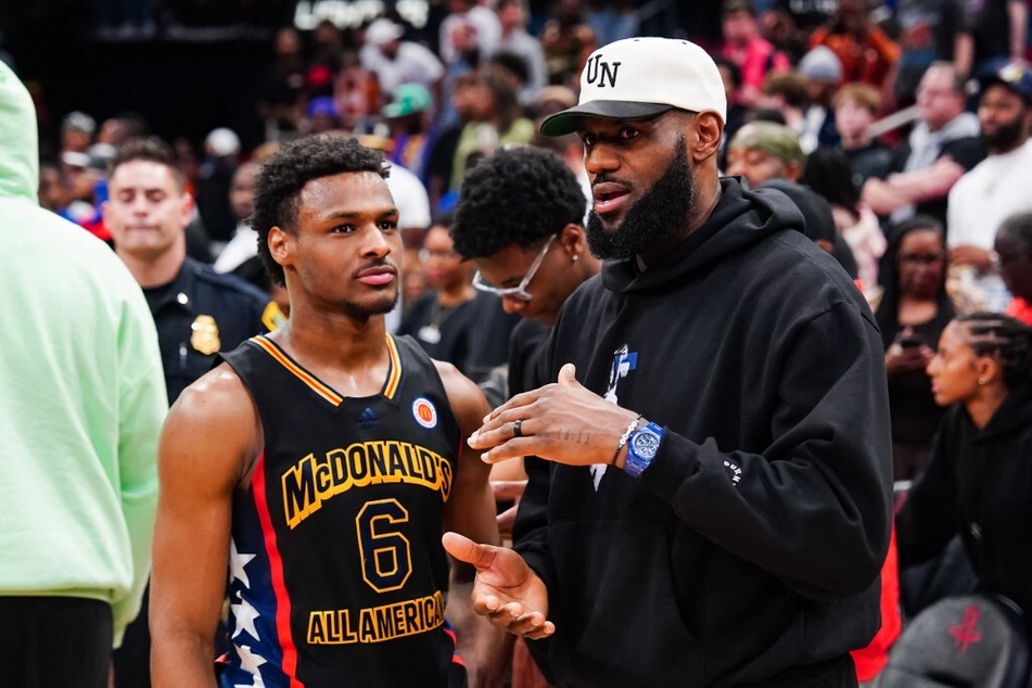 On Monday, Los Angeles Lakers star LeBron James (r.) provided an update on his son Bronny James' status.