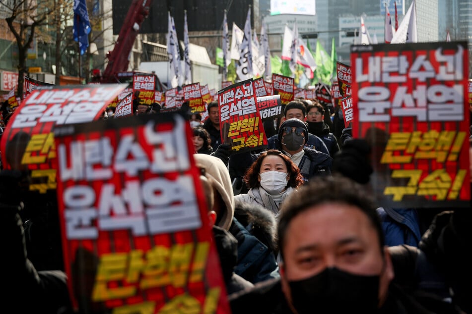 Protesters attend a rally calling for the impeachment of South Korean President Yoon Suk Yeol in Seoul on December 12, 2024.