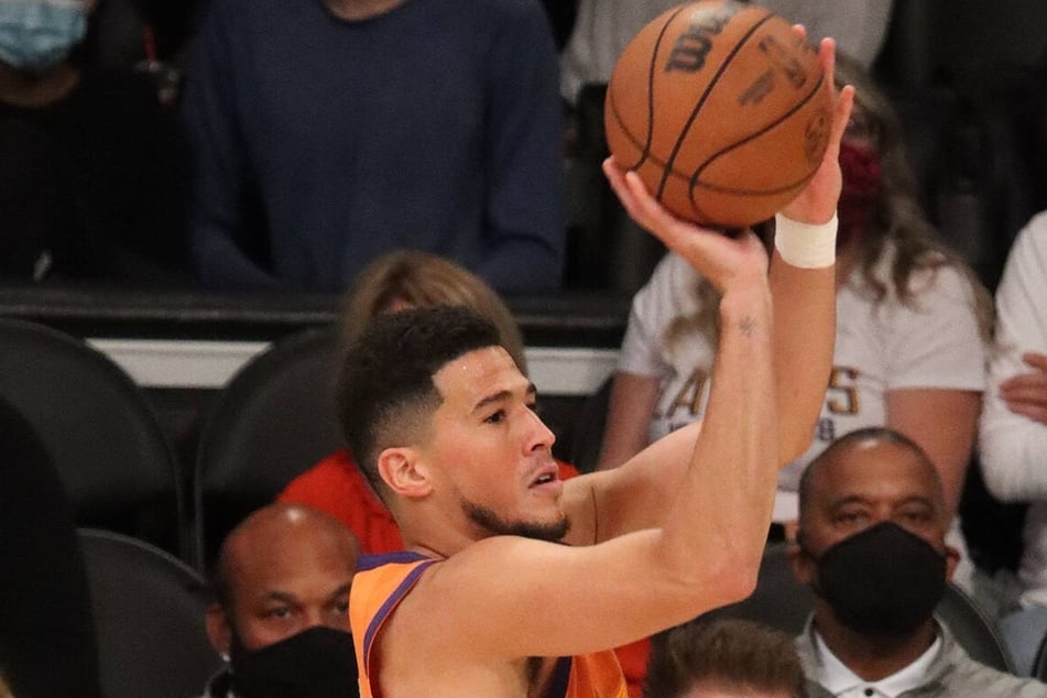 Devin Booker returned to the Suns after seven games away to score 16 points against the Hornets.