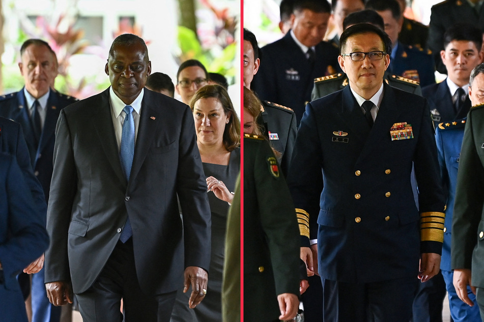 US Secretary of Defense Lloyd Austin (l.) met his Chinese counterpart Dong Jun in Singapore Thursday, in talks meant to defuse tensions between the two countries.