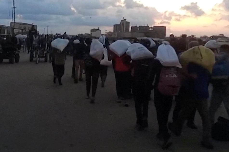 Palestinians have been forced to travel miles in dangerous conditions to reach the few aid centers set up by the Gaza Humanitarian Foundation.