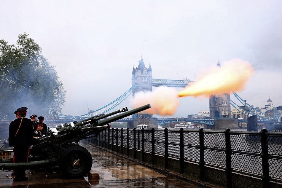 Members of the Honourable Artillery Company fire a 62 Gun Royal Salute, to mark the first anniversary of the coronation of the UK's King Charles III and Queen Camilla.