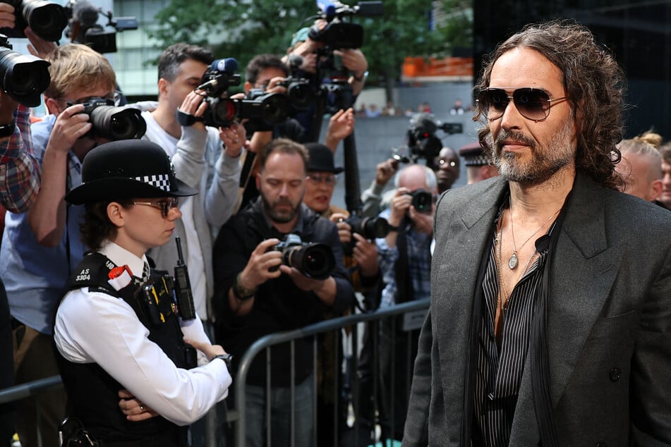 Comedian Russell Brand enters plea in shocking rape case