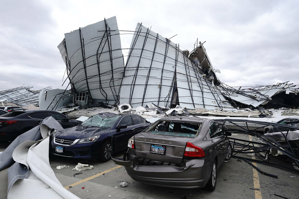 Twisted metal and chunks of concrete crushing vehicles – all that's left of the Amazon Hub in Edwardsville, Illinois.