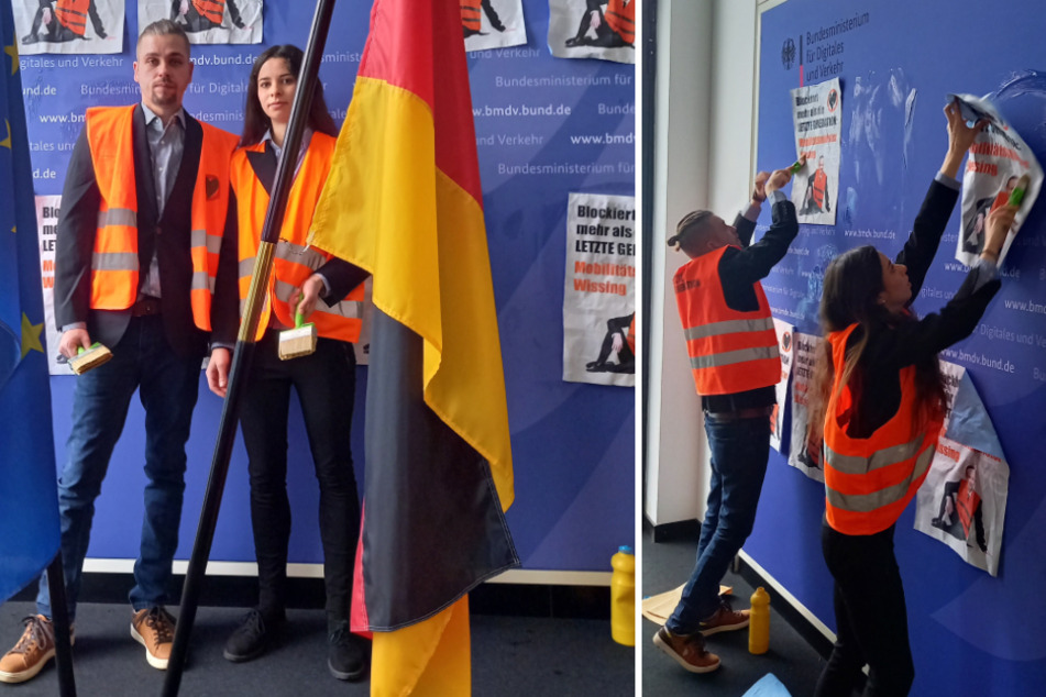 Aktivisten der "Letzten Generation" bekleben eine Innenwand des Bundesverkehrsministeriums in Berlin mit Plakaten.