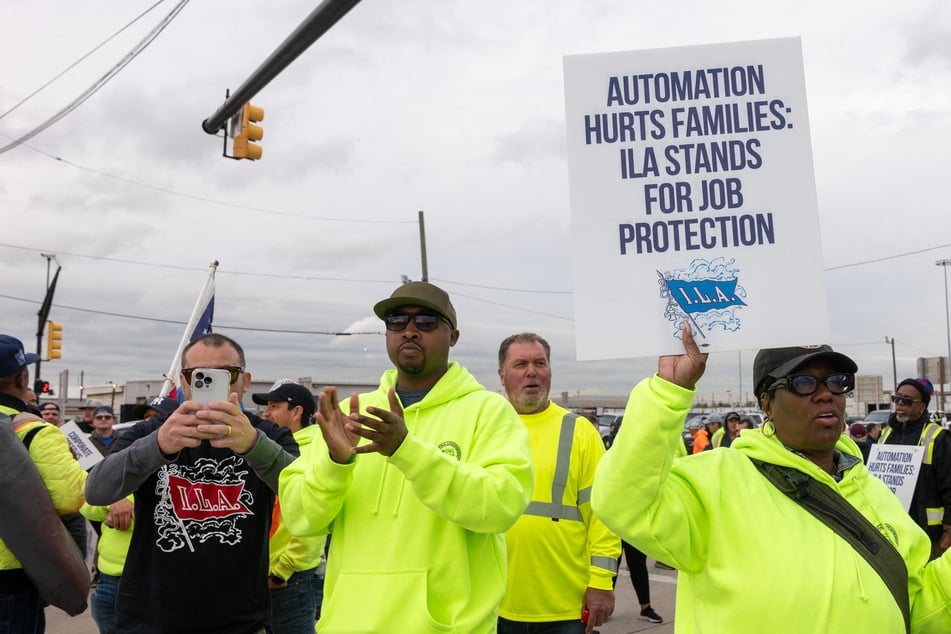 Cranes stand still as striking dockworkers fight for their "future"