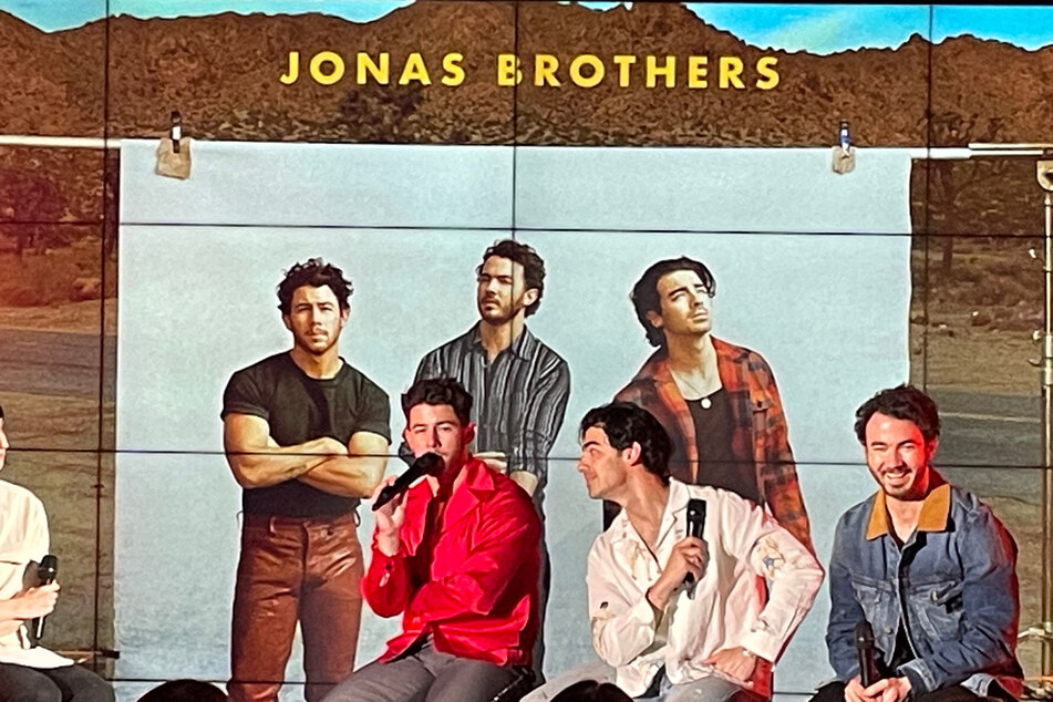 (From l. to r.) Nick, Joe, and Kevin Jonas spilled on their new album, The Album, at a livestream event hosted by TalkShopLive.